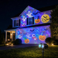 Lumora projecting Halloween ghosts, pumpkins and bats on a house