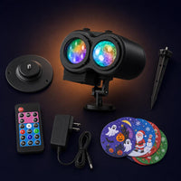 What's in the box: Lumora projector, base, stake, remote, adapter and holiday slides
